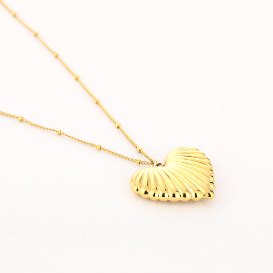 Lange ketting met schelpenhart