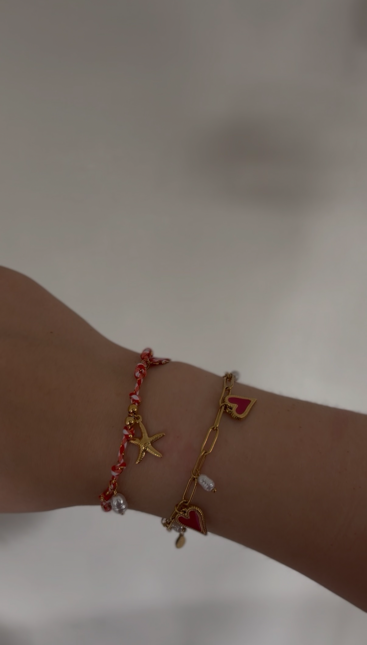 Schakel armband met parels en hart